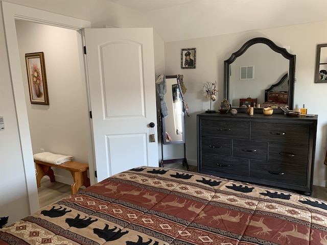 138 Lowe Rd, Chesnee, SC 29323 - bedroom featuring wood finished floors and vaulted ceiling