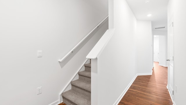110 Sunriff Ct, Greer, SC 29651 - stairway with wood finished floors and recessed lighting