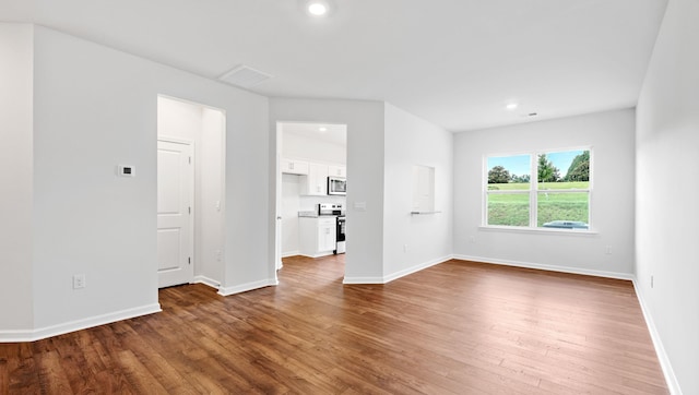 110 Sunriff Ct, Greer, SC 29651 - spare room featuring wood finished floors and recessed lighting