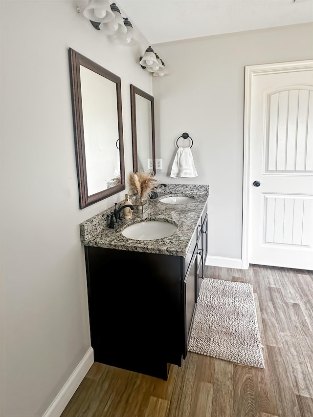 739 Shelburne Ln, Lyman, SC 29365 - bathroom featuring double vanity and wood finished floors