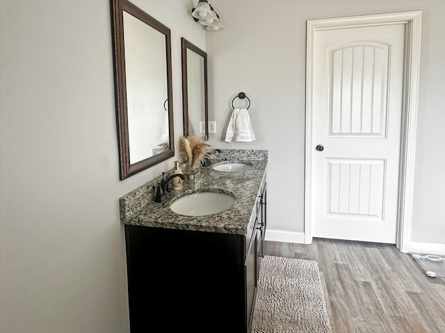 739 Shelburne Ln, Lyman, SC 29365 - bathroom with double vanity and wood finished floors