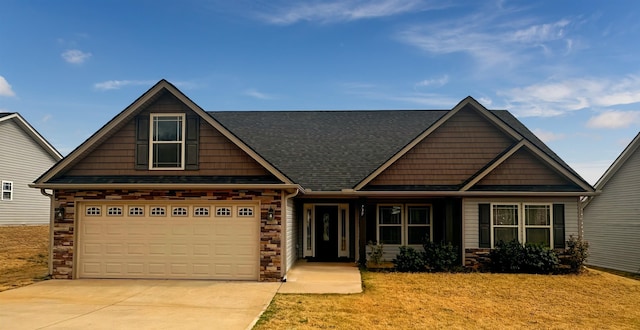 739 Shelburne Ln, Lyman, SC 29365 - craftsman-style home featuring concrete driveway, stone siding, a front yard, and a shingled roof
