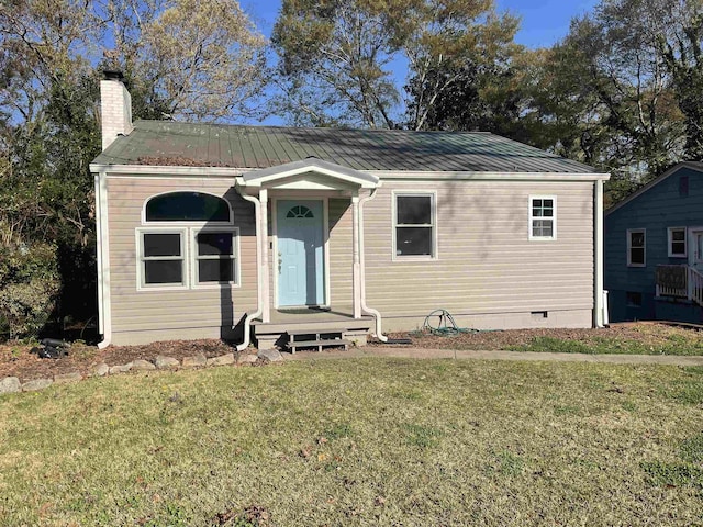 126 White Oak Rd, Spartanburg, SC 29301 - view of front of property featuring a front lawn, a chimney, a metal roof, and crawl space