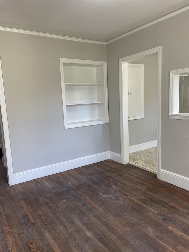 126 White Oak Rd, Spartanburg, SC 29301 - unfurnished room featuring dark wood finished floors, crown molding, and built in features