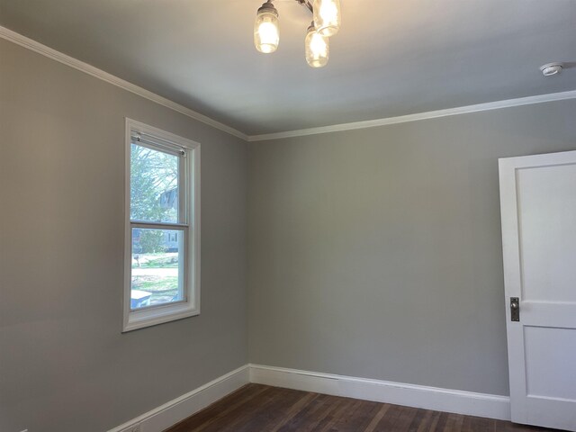126 White Oak Rd, Spartanburg, SC 29301 - empty room with a chandelier, crown molding, dark wood-style floors, and a smoke detector