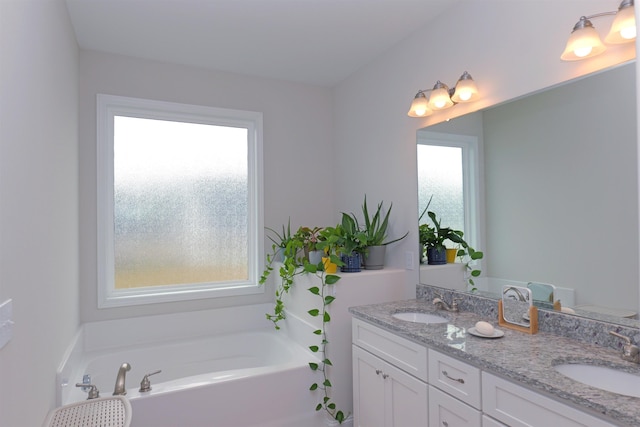 2054 Lachaise Ln, Moore, SC 29369 - bathroom featuring double vanity and a garden tub
