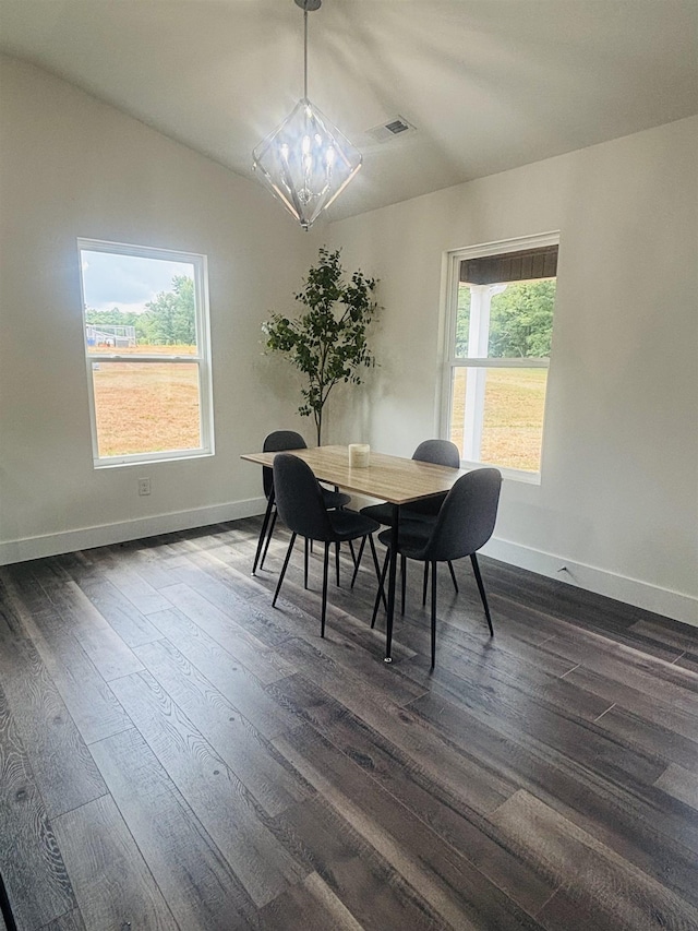 776 Darwin Rd, Gaffney, SC 29340 - dining area featuring dark wood-type flooring, vaulted ceiling, and a chandelier