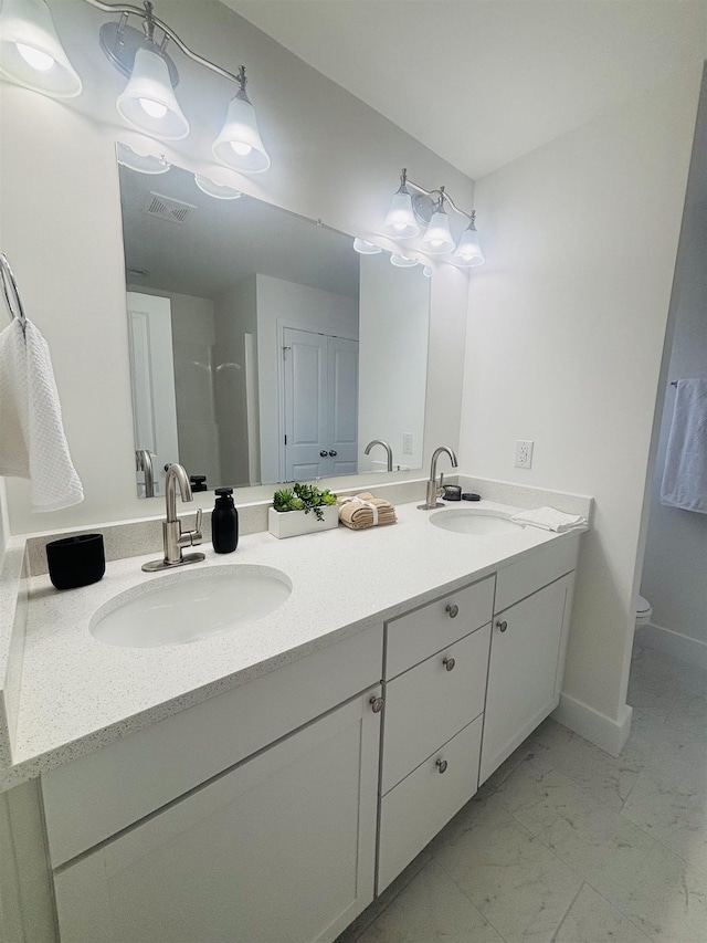 776 Darwin Rd, Gaffney, SC 29340 - full bathroom with double vanity and marble finish floors