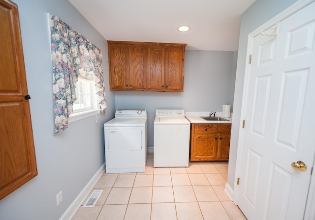 316 Whitfield Ln, Boiling Springs, SC 29316 - washroom featuring washing machine and clothes dryer, cabinet space, light tile patterned floors, and recessed lighting