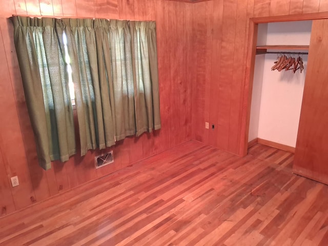 109 Shoally, Boiling Springs, SC 29316 - unfurnished bedroom featuring wood finished floors and wooden walls