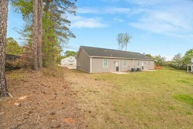 119 N Moore St, Duncan, SC 29334 - rear view of house featuring a lawn and a patio area
