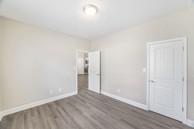 119 N Moore St, Duncan, SC 29334 - unfurnished bedroom featuring wood finished floors and baseboards