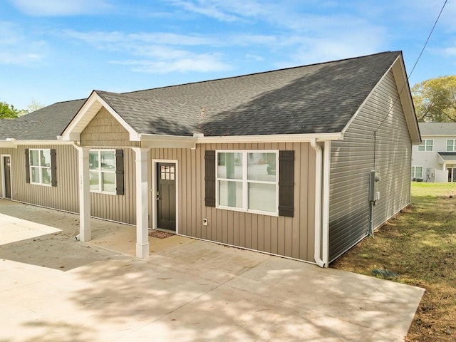 121 N Moore St, Duncan, SC 29334 - view of front of property featuring a shingled roof and a patio area