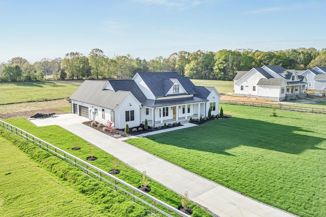164 Triangle Pine Rd, Fountain Inn, SC 29644 - view of front of property with a porch, a standing seam roof, a metal roof, concrete driveway, and an attached garage