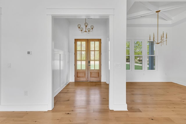 164 Triangle Pine Rd, Fountain Inn, SC 29644 - foyer with a chandelier, light wood-style floors, french doors, plenty of natural light, and beamed ceiling