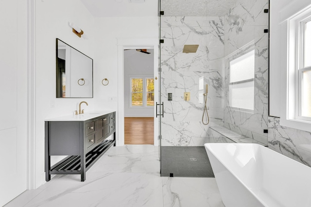 164 Triangle Pine Rd, Fountain Inn, SC 29644 - bathroom featuring a freestanding bath, a marble finish shower, vanity, and marble tiled flooring