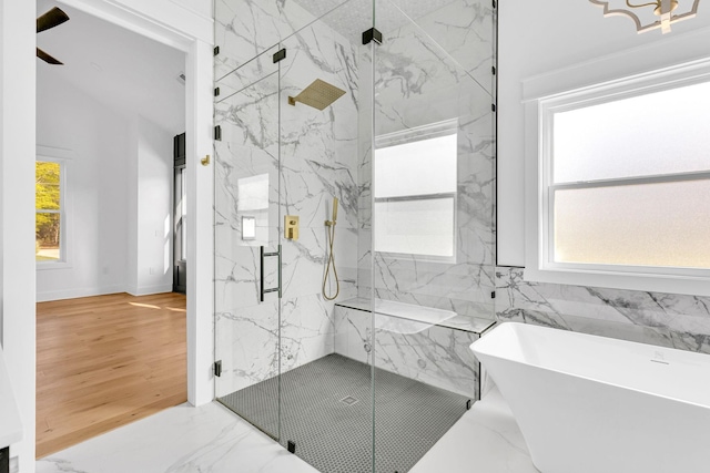 164 Triangle Pine Rd, Fountain Inn, SC 29644 - full bathroom with a freestanding tub, marble tiled flooring, and a marble finish shower