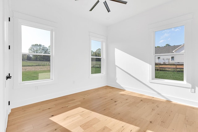 164 Triangle Pine Rd, Fountain Inn, SC 29644 - unfurnished room with light wood finished floors, plenty of natural light, and ceiling fan