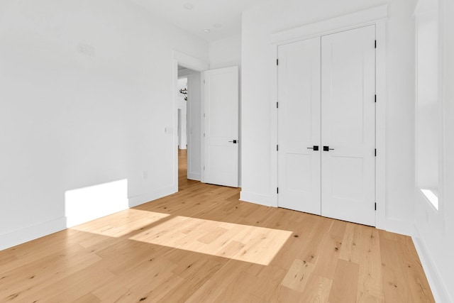 164 Triangle Pine Rd, Fountain Inn, SC 29644 - unfurnished bedroom featuring light wood-style flooring and a closet