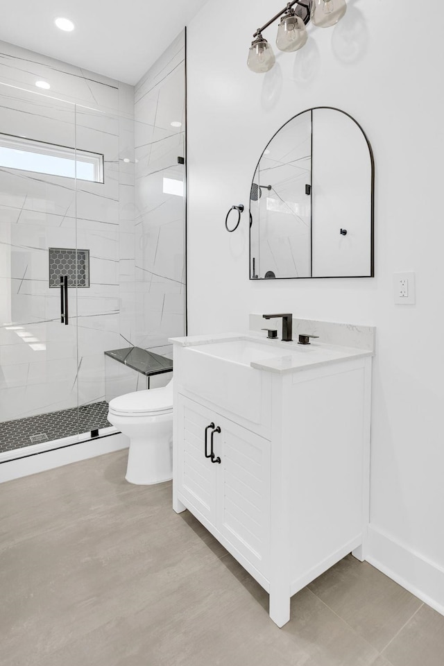 164 Triangle Pine Rd, Fountain Inn, SC 29644 - bathroom featuring vanity, a marble finish shower, and recessed lighting