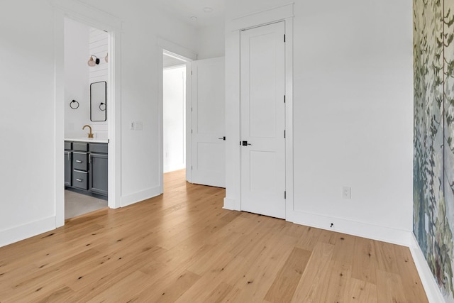 164 Triangle Pine Rd, Fountain Inn, SC 29644 - unfurnished bedroom featuring light wood-style floors and ensuite bathroom