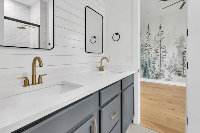 164 Triangle Pine Rd, Fountain Inn, SC 29644 - full bathroom featuring double vanity, a shower with door, wood finished floors, and ceiling fan