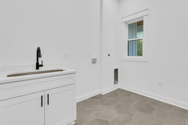 164 Triangle Pine Rd, Fountain Inn, SC 29644 - laundry area with electric dryer hookup, washer hookup, and cabinet space