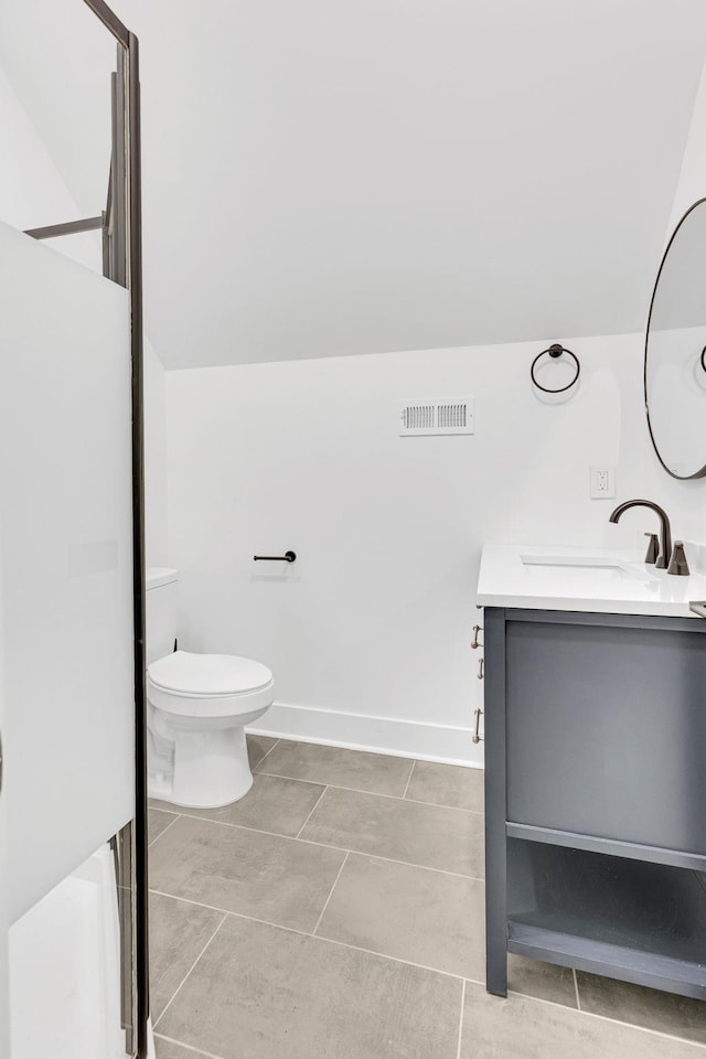164 Triangle Pine Rd, Fountain Inn, SC 29644 - full bathroom featuring vanity, tile patterned floors, and lofted ceiling