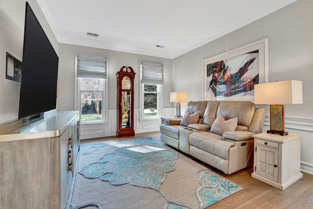 10 Torrey Pines Ct, Spartanburg, SC 29306 - living room featuring light wood finished floors, ornamental molding, and a wainscoted wall