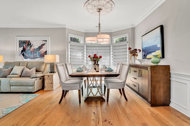 10 Torrey Pines Ct, Spartanburg, SC 29306 - dining space with light wood finished floors, ornamental molding, and a wainscoted wall
