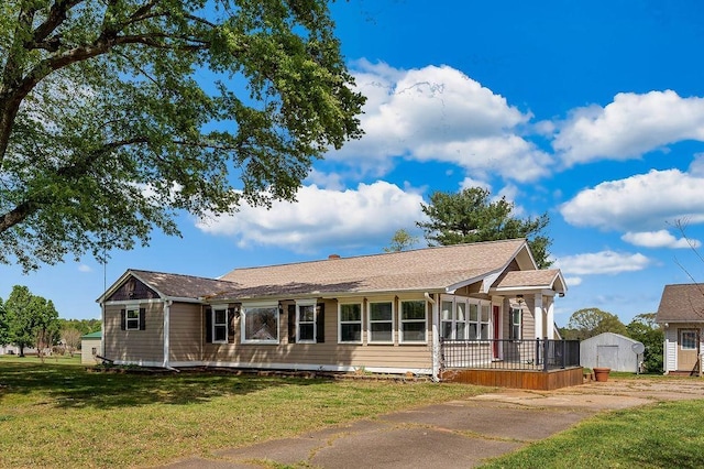 1620 Rainbow Lake Rd, Inman, SC 29349 - ranch-style house featuring a storage shed, a front lawn, and driveway