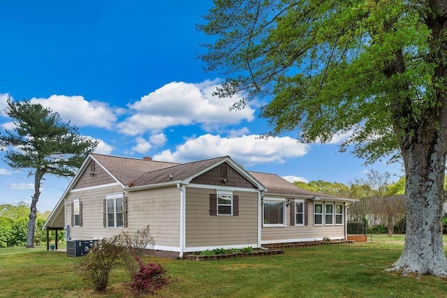 1620 Rainbow Lake Rd, Inman, SC 29349 - view of side of home with a lawn and a central AC unit