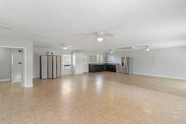 1620 Rainbow Lake Rd, Inman, SC 29349 - unfurnished living room with a ceiling fan and light tile patterned floors