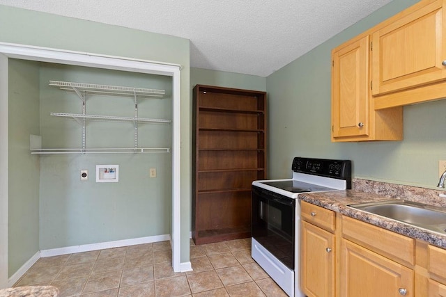 1620 Rainbow Lake Rd, Inman, SC 29349 - kitchen featuring electric range, light brown cabinetry, a textured ceiling, light tile patterned flooring, and dark countertops