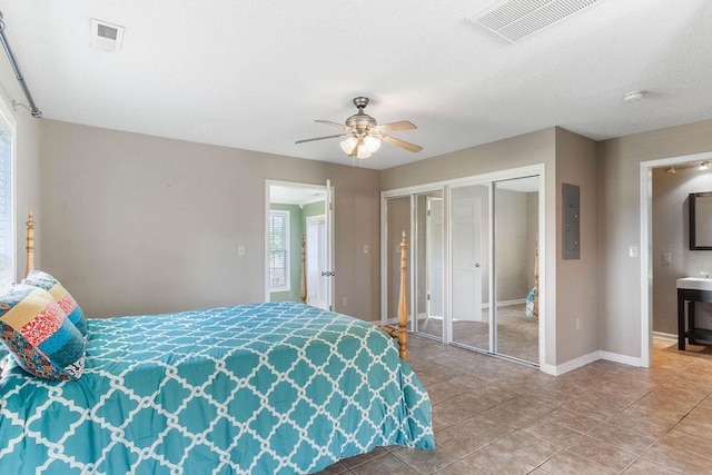 1620 Rainbow Lake Rd, Inman, SC 29349 - tiled bedroom featuring electric panel and a ceiling fan