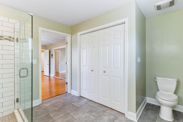 1620 Rainbow Lake Rd, Inman, SC 29349 - bathroom featuring a closet and a stall shower