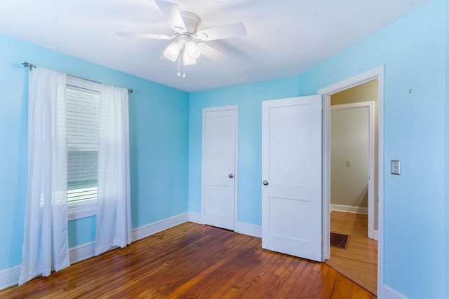 1620 Rainbow Lake Rd, Inman, SC 29349 - unfurnished bedroom featuring wood-type flooring, ceiling fan, and a closet
