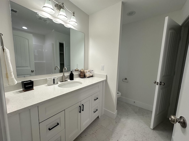 136 Dendy Dr, Wellford, SC 29385 - bathroom with vanity and marble look tile flooring
