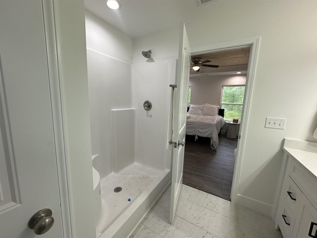 136 Dendy Dr, Wellford, SC 29385 - ensuite bathroom with a stall shower, vanity, ceiling fan, recessed lighting, and marble look tile flooring