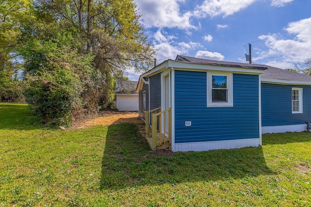 114 Woodrow St, Union, SC 29379 - view of side of home with a lawn