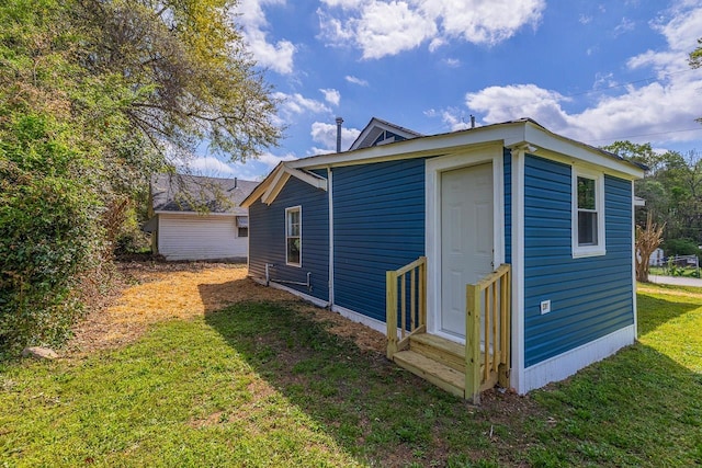 114 Woodrow St, Union, SC 29379 - view of property exterior with a lawn and entry steps