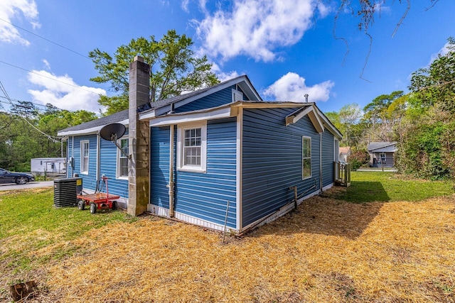 114 Woodrow St, Union, SC 29379 - view of property exterior with a chimney and a yard