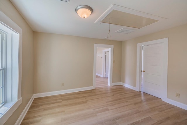 114 Woodrow St, Union, SC 29379 - unfurnished room featuring attic access and light wood finished floors