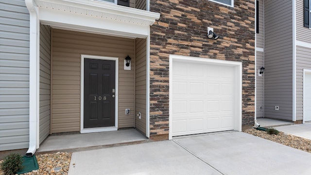 108 Sunriff Ct, Greer, SC 29651 - entrance to property featuring stone siding, driveway, and a garage