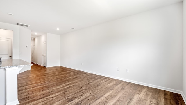 108 Sunriff Ct, Greer, SC 29651 - unfurnished living room with wood finished floors and recessed lighting