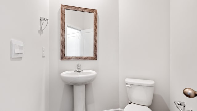108 Sunriff Ct, Greer, SC 29651 - bathroom featuring toilet and baseboards