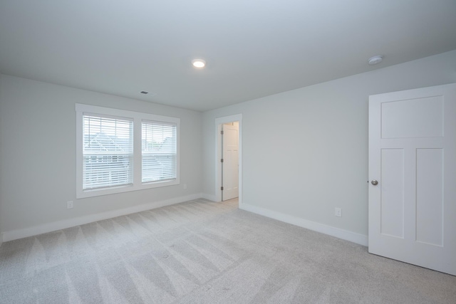 832 Redmill Ln, Duncan, SC 29334 - spare room featuring a smoke detector and light carpet