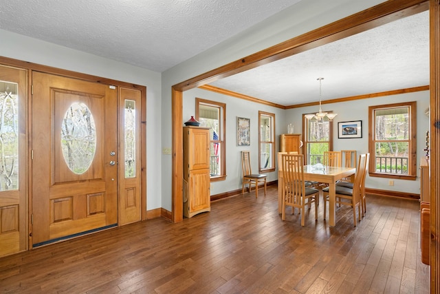 116 Dorothy Ln, Pickens, SC 29671 - dining area with a chandelier, wood-type flooring, a textured ceiling, and ornamental molding