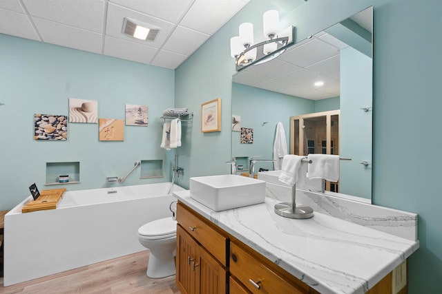 116 Dorothy Ln, Pickens, SC 29671 - bathroom featuring a paneled ceiling, a garden tub, wood finished floors, vanity, and a shower stall