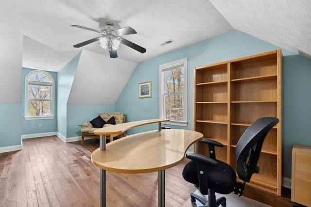 116 Dorothy Ln, Pickens, SC 29671 - office area with vaulted ceiling, a textured ceiling, a ceiling fan, wood finished floors, and plenty of natural light